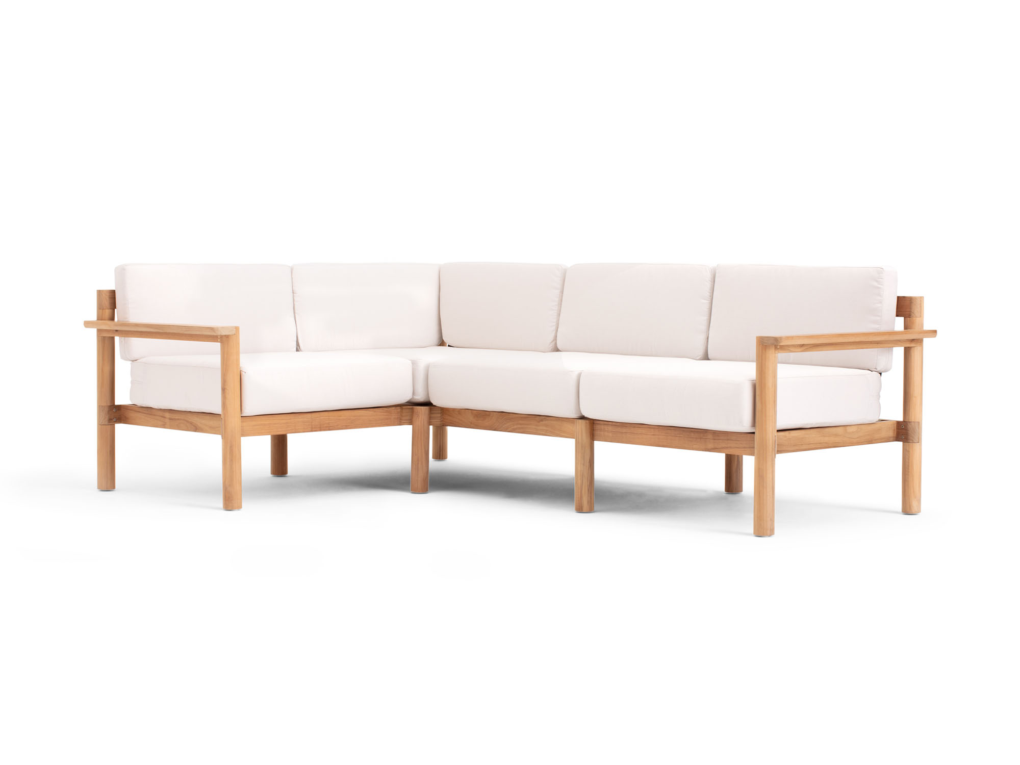 Front angle view of 4-piece outdoor sectional with white cushions
